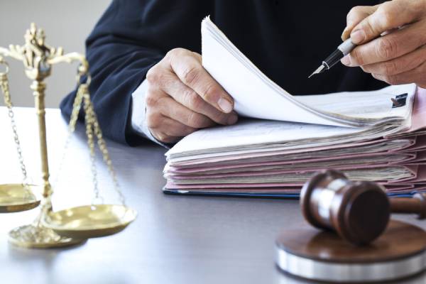 judge signing a document
